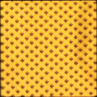 Repeating floral textile pattern in warm yellow and rust brown, featuring a distressed texture and all-over design, identified as egoitaliano bounce fabric.